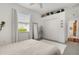 Bright bedroom with a ceiling fan, window, closet for storage, and decorations at 826 Oak Briar Ln, Osprey, FL 34229