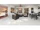 Elegant patio with easy access to gourmet kitchen and comfortable outdoor seating area at 826 Oak Briar Ln, Osprey, FL 34229