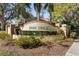 Attractive community entrance sign for Park Trace, surrounded by manicured landscaping and mature trees at 826 Oak Briar Ln, Osprey, FL 34229
