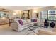 Cozy living area with dining space and plenty of natural light at 8779 Midnight Pass Rd # 106H, Sarasota, FL 34242