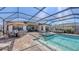 Stunning screened patio with a pool and spa, and plenty of room for Gathering and guests at 8982 Baroque Ter, Sarasota, FL 34240