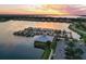 Gorgeous aerial view of marina, with many boat slips, on the bay at sunset at 910 Tidewater Shores Loop # 107, Bradenton, FL 34208