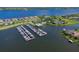 Aerial view showing the community boat docks on the lake at 910 Tidewater Shores Loop # 107, Bradenton, FL 34208