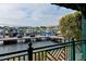 View of marina with multiple boat slips and serene water views from the balcony at 910 Tidewater Shores Loop # 107, Bradenton, FL 34208