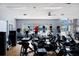 Bright fitness center with a range of equipment and a scenic view of the pool at 9408 Glen Abbey Ln, Sarasota, FL 34238
