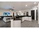 Kitchen featuring breakfast bar and stainless steel sink at 9408 Glen Abbey Ln, Sarasota, FL 34238