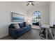 Comfortable office space featuring a large window, calming decor, and a ceiling fan at 9408 Glen Abbey Ln, Sarasota, FL 34238