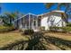 Enclosed outdoor patio with screen, perfect for enjoying the beautiful weather at 9408 Glen Abbey Ln, Sarasota, FL 34238