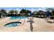 Community swimming pool and whirlpool spa perfect for relaxation and recreation at 9408 Glen Abbey Ln, Sarasota, FL 34238