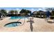 Beautiful pool and hot tub area with patio furniture, perfect for relaxation and leisure at 9408 Glen Abbey Ln, Sarasota, FL 34238