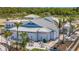 Exterior of the Tide Bar & Grill with outdoor seating and coastal architecture at 9928 Bright Water Dr, Englewood, FL 34223