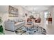 Cozy living room flows into dining area and kitchen for easy entertaining at 9928 Bright Water Dr, Englewood, FL 34223