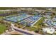 Aerial view of tennis and bocce ball courts, near pool, surrounded by palms and blue sunshades at 9928 Bright Water Dr, Englewood, FL 34223