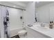 Bright bathroom featuring a bathtub and shower, a toilet, and a sink with vanity at 8612 Lunar Skye St, Sarasota, FL 34241