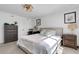 Cozy bedroom featuring neutral tones, soft lighting, and comfortable furnishings at 8612 Lunar Skye St, Sarasota, FL 34241