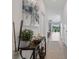 Bright foyer with modern decor, tiled floors, and an open view to the living space at 8612 Lunar Skye St, Sarasota, FL 34241