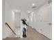 Clean and well-lit hallway with neutral tones and decorative accents at 8612 Lunar Skye St, Sarasota, FL 34241