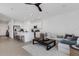 Open-concept living area with kitchen, and living room. Perfect for entertaining Gathering and friends at 8612 Lunar Skye St, Sarasota, FL 34241