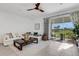 Open living room featuring a sliding glass door to an outdoor lanai with nice views at 8612 Lunar Skye St, Sarasota, FL 34241