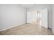 This bedroom features tiled flooring and an ensuite bathroom at 11165 Balfour St, Venice, FL 34293