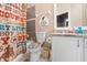 Charming bathroom with a western-themed shower curtain and coordinated decor at 13040 Quigley Ave, Weeki Wachee, FL 34614
