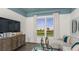 Cozy living room featuring comfortable seating, a TV, and large window with scenic views, perfect for relaxation at 14919 Contenta Loop, Bradenton, FL 34211