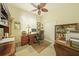 Traditional home office featuring a classic wooden desk, ample storage, and a comfortable workspace at 150 Medici Ter, North Venice, FL 34275