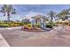Waterford Windsor Park entrance features well-maintained landscaping and a charming guard house at 1511 Waterford Dr, Venice, FL 34292