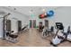 Well-equipped fitness center with a variety of modern exercise machines and free weights at 1511 Waterford Dr, Venice, FL 34292