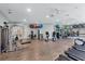 Spacious fitness center with strength training equipment and cardio machines at 1511 Waterford Dr, Venice, FL 34292