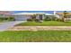 Charming single-story home with a well-manicured lawn and inviting curb appeal at 1511 Waterford Dr, Venice, FL 34292
