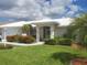 Charming single-story home featuring a well-maintained lawn and mature landscaping, creating a welcoming curb appeal at 1511 Waterford Dr, Venice, FL 34292