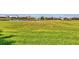 Beautiful view of a well-maintained golf course with scenic water features at 1511 Waterford Dr, Venice, FL 34292