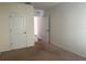 A bright bedroom features neutral carpeting and light-colored walls at 15517 Rose Grove Dr, Bradenton, FL 34212