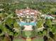 Aerial view highlighting the community's impressive clubhouse, pool, and beautifully landscaped grounds at 16407 Daysailor Trl, Lakewood Ranch, FL 34202