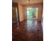 Open-concept dining room with natural light and tile flooring at 1862 Orangewood Ln, Sarasota, FL 34232