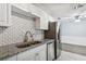 Updated kitchen featuring granite counters and stainless steel appliances at 2039 Kai Dr, Sarasota, FL 34231