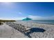 Relax on the beach with chair and umbrella service; a peaceful spot where you can unwind and enjoy the ocean breeze at 2045 Gulf Of Mexico Dr # M1-310, Longboat Key, FL 34228