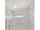 Bright bathroom features a tub, shower, and grab bars for assistance at 2407 Waterford Ct, Palmetto, FL 34221
