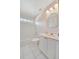 Bright bathroom features a tub, shower, and vanity with white cabinets at 2407 Waterford Ct, Palmetto, FL 34221