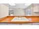 Kitchen sink with a view of a bright living space at 2407 Waterford Ct, Palmetto, FL 34221