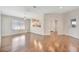 Open-concept living room with hardwood floors and natural light at 2407 Waterford Ct, Palmetto, FL 34221