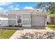 Charming single-Gathering home with a well-maintained lawn and a two-car garage at 2408 28Th E Ave, Palmetto, FL 34221