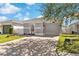 Charming single-Gathering home with a well-maintained lawn and a two-car garage at 2408 28Th E Ave, Palmetto, FL 34221
