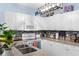 Well-equipped kitchen with white cabinets, modern appliances, and stylish backsplash at 2408 28Th E Ave, Palmetto, FL 34221