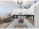 Functional kitchen featuring white cabinetry, modern appliances, and ample counter space at 2408 28Th E Ave, Palmetto, FL 34221