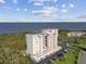 Breathtaking aerial view of a condominium complex with lush landscaping and waterfront views at 2625 Terra Ceia Bay Blvd # 506, Palmetto, FL 34221