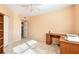 Bright bedroom with tile floors, ceiling fan, and closet provides comfortable living space at 2625 Terra Ceia Bay Blvd # 506, Palmetto, FL 34221