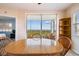Bright dining room features tile floor, balcony access and views of the water at 2625 Terra Ceia Bay Blvd # 506, Palmetto, FL 34221