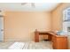 Office with tile flooring, desk, window with shutters, printer, and ceiling fan at 2625 Terra Ceia Bay Blvd # 506, Palmetto, FL 34221